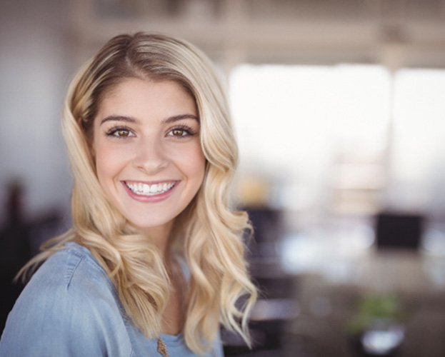 closeup of young woman smiling